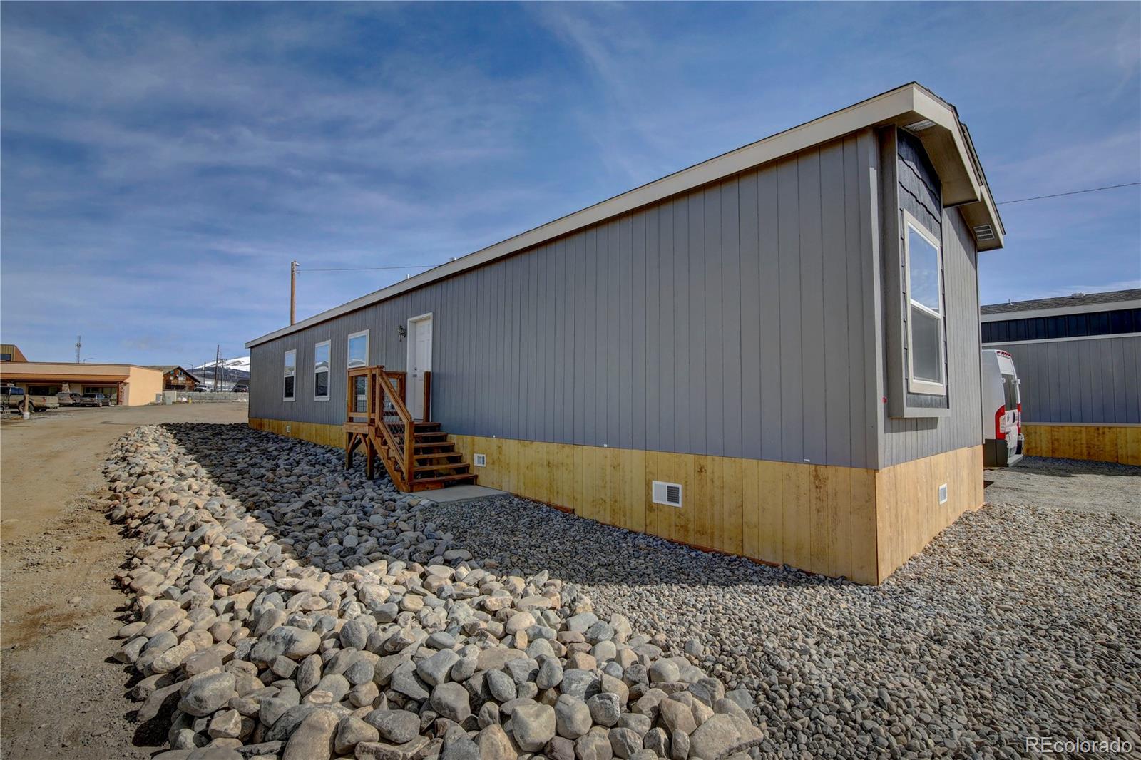 125 12th Street Fairplay, CO 80440 - Photo 2 of 17 a front view of a house with a yard