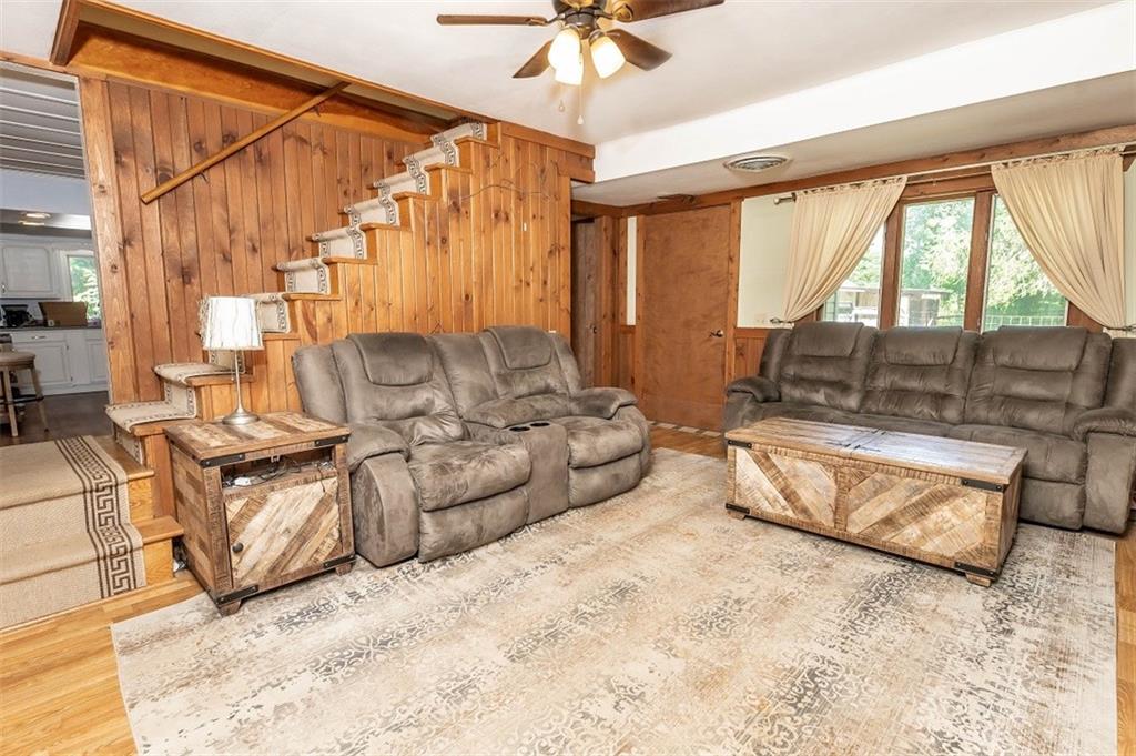 47 McMillen Road Home, PA 15747 - Photo 8 of 19 a living room with furniture and a large window
