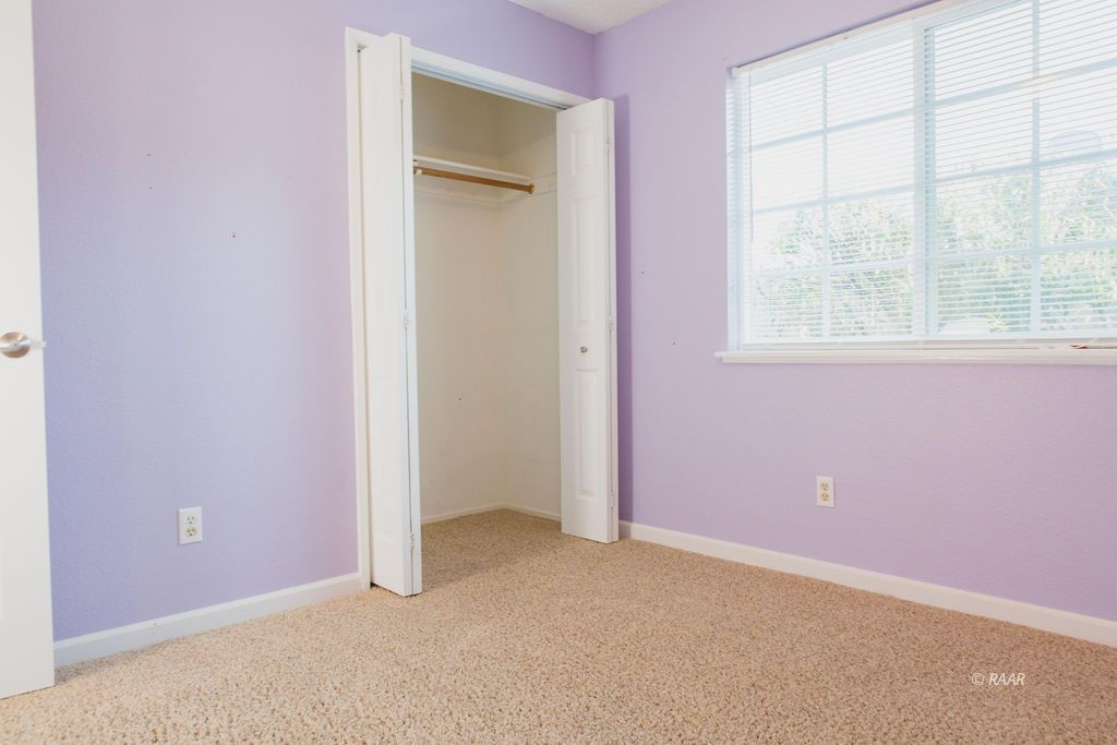 620 Heather Court Ridgecrest, CA 93555 - Photo 20 of 26 an empty room with a window