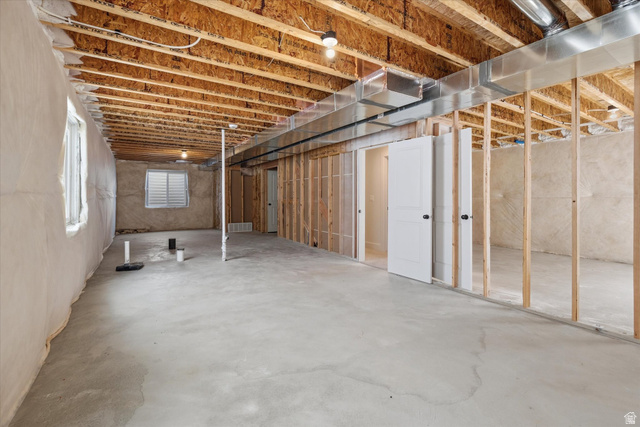 730 West 500 North Smithfield, UT 84335 - Photo 24 of 46 Unfinished basement with concrete flooring and exposed ceiling joists