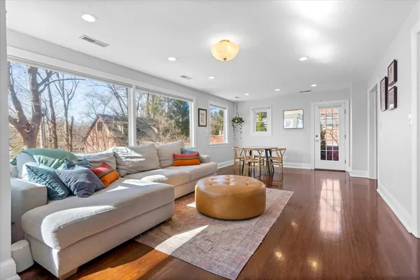 a living room with furniture and a table