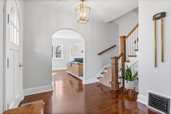 a view of entryway with wooden floor