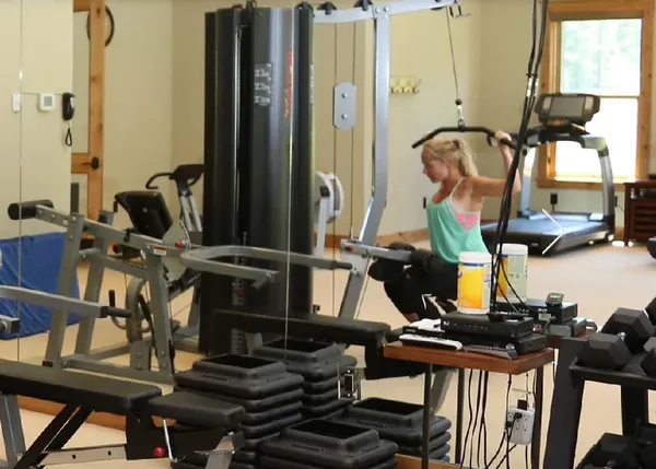a view of a room with gym equipment