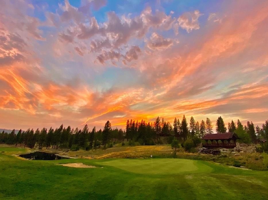 404 Blacktail Ridge Portola, CA 96122 - Photo 14 of 15 a view of a golf course with a lake