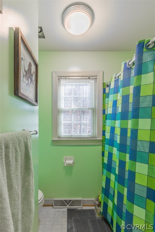 826 Jackson Road Bumpass, VA 23024 - Photo 17 of 26 a view of a room with a window and a shower