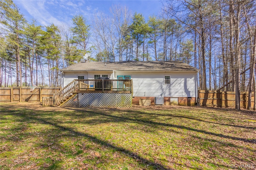 826 Jackson Road Bumpass, VA 23024 - Photo 26 of 26 a view of a house with a big yard and large trees
