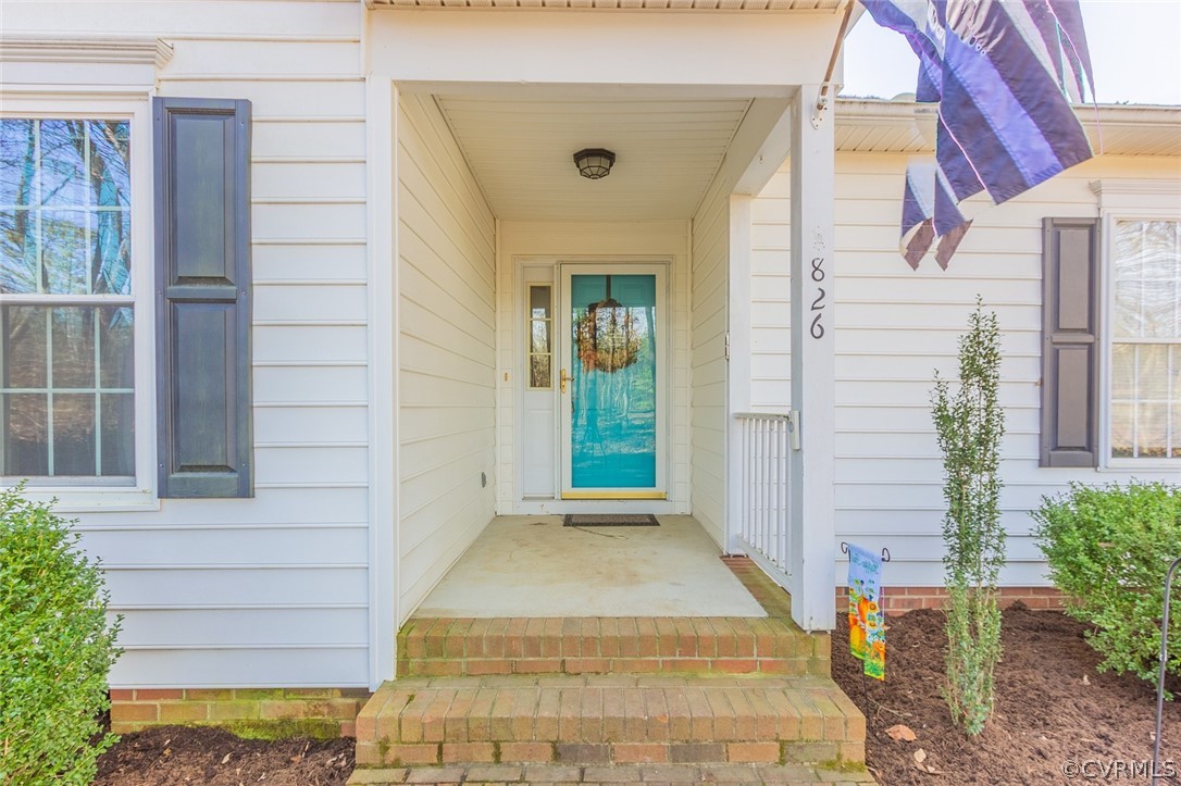 826 Jackson Road Bumpass, VA 23024 - Photo 3 of 26 a view of a entryway door of the house
