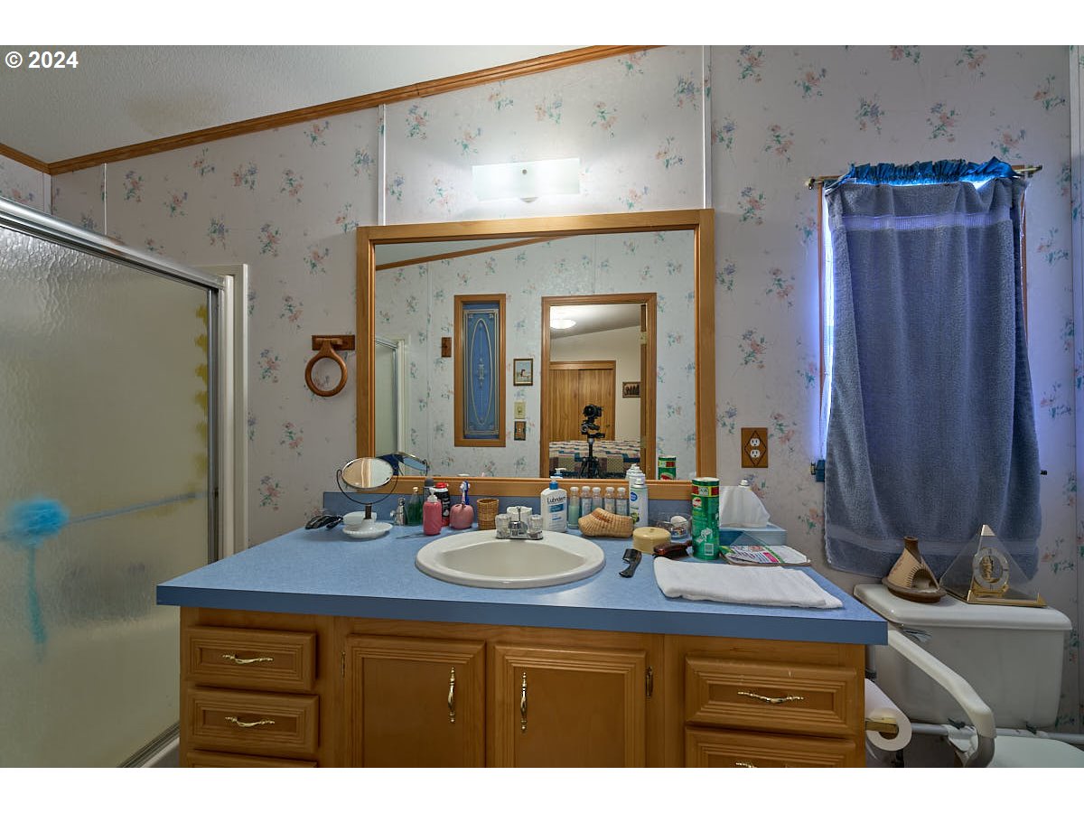 73745 Lower Imnaha Road Imnaha, OR 97842 - Photo 16 of 34 a bathroom with a sink and a mirror
