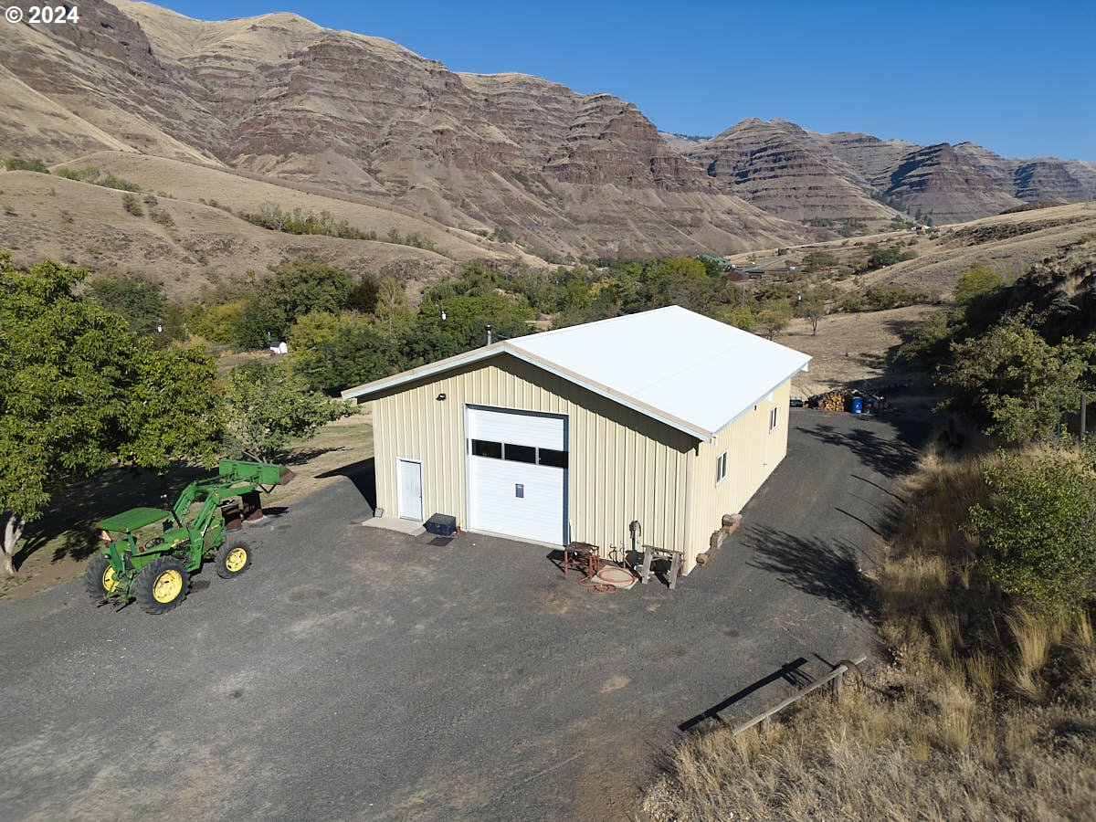73745 Lower Imnaha Road Imnaha, OR 97842 - Photo 3 of 34 a view of a house with a mountain