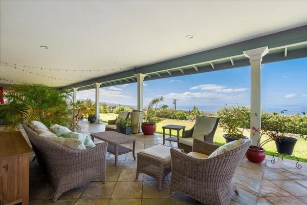 a building outdoor space with patio furniture