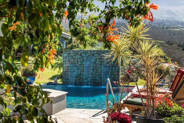 a view of yard with patio