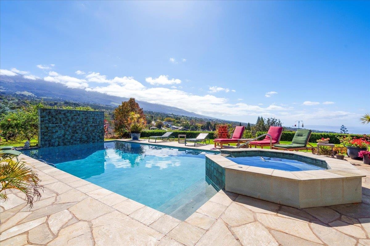 40 Pulehu Road Kula, HI 96790 - Photo 21 of 49 a view of a swimming pool and an outdoor seating