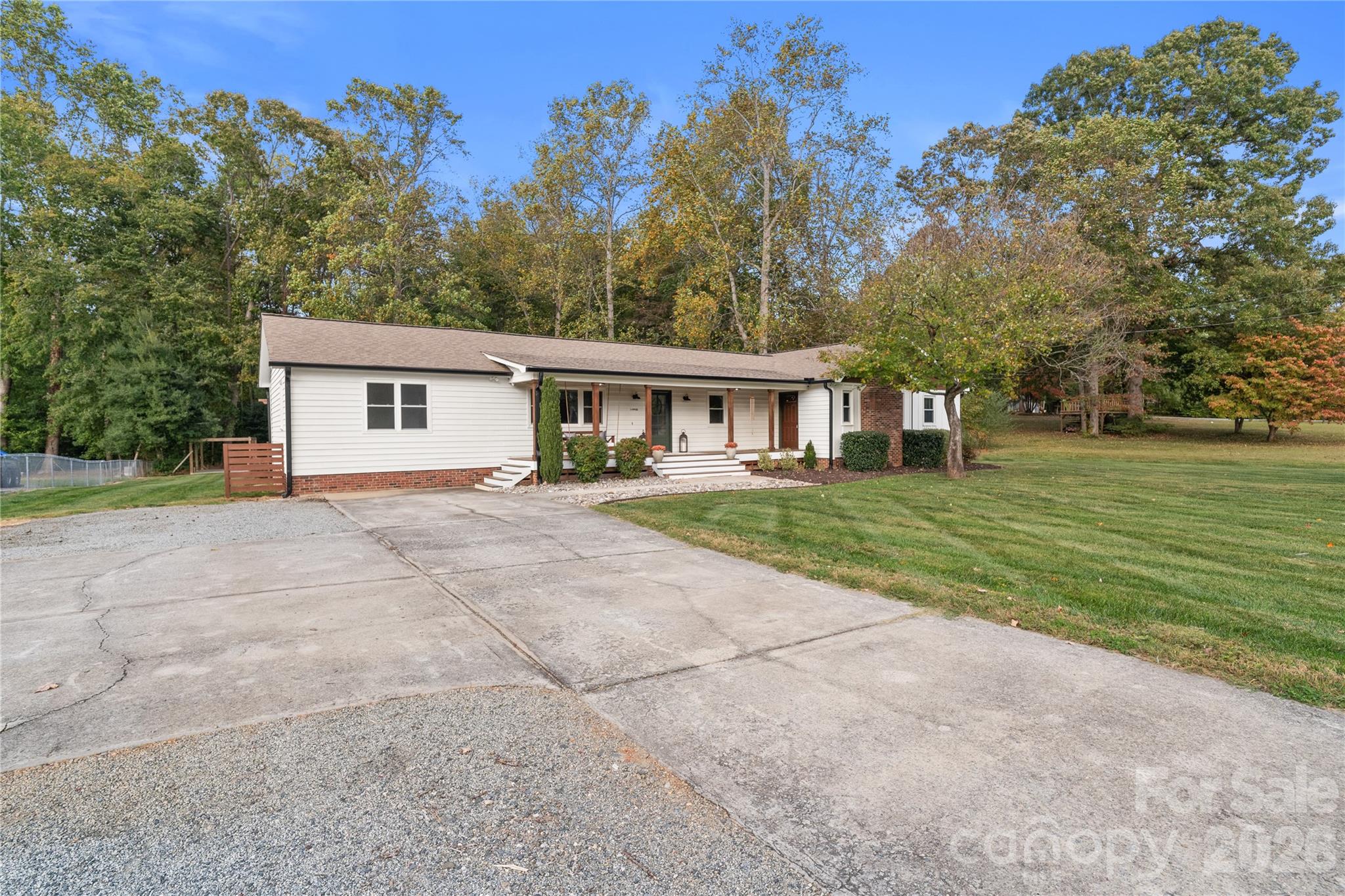 1335 Blacksnake Road Stanley, NC 28164 - Photo 2 of 31 a front view of a house with a yard