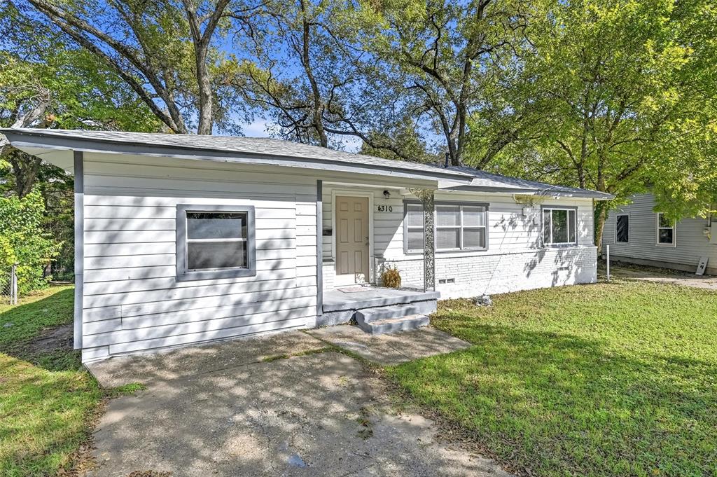 4310 Utah Avenue Dallas, TX 75216 - Photo 14 of 14 front view of a house with a yard