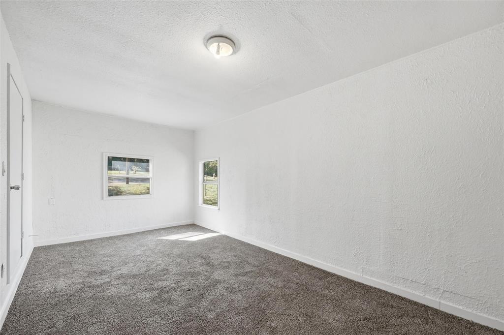 4310 Utah Avenue Dallas, TX 75216 - Photo 5 of 14 an empty room with windows