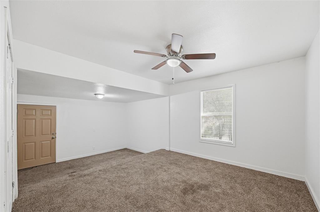 4310 Utah Avenue Dallas, TX 75216 - Photo 10 of 14 a view of an empty room with a window