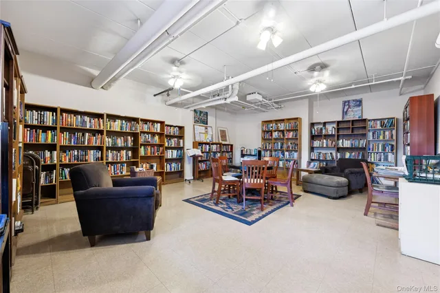 a room with furniture and a large window