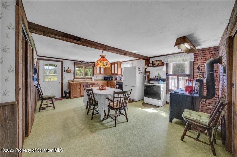 10846 Forest Lake Road Montrose, PA 18801 - Photo 13 of 42 a dining room with furniture and window