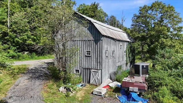 a balcony view with a garden space