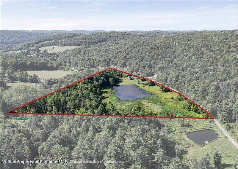 10846 Forest Lake Road Montrose, PA 18801 - Photo 4 of 42 an aerial view of a house