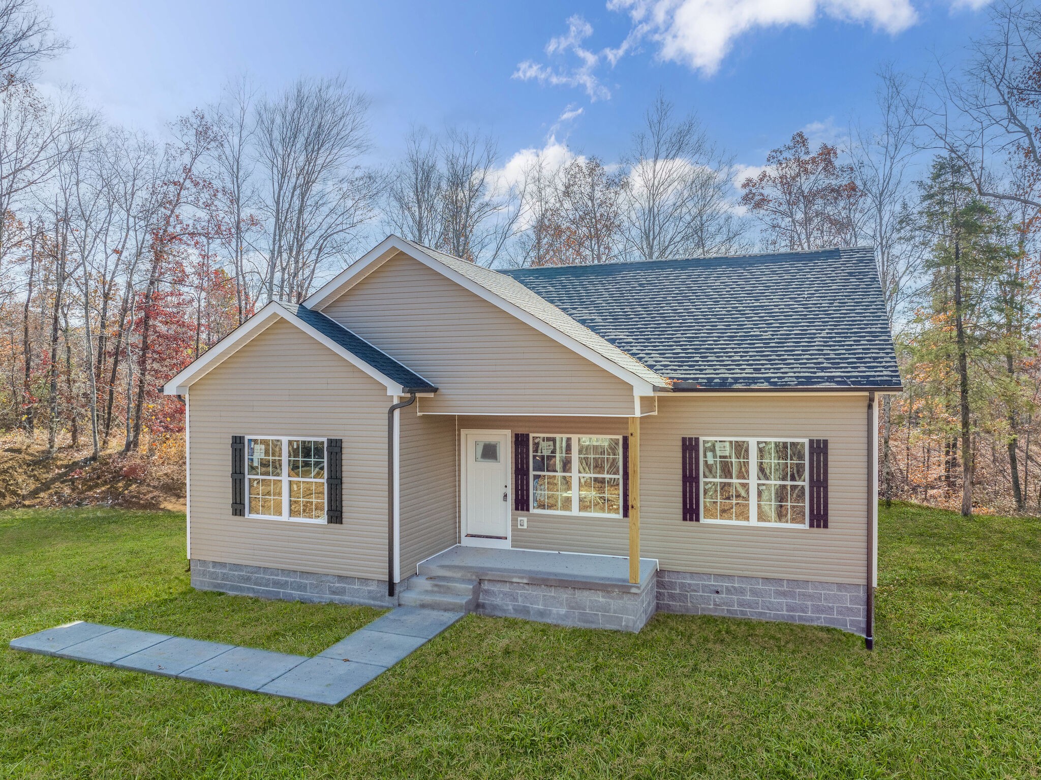 511 Sam Hollow Road Dickson, TN 37055 - Photo 3 of 40 a front view of a house with a garden