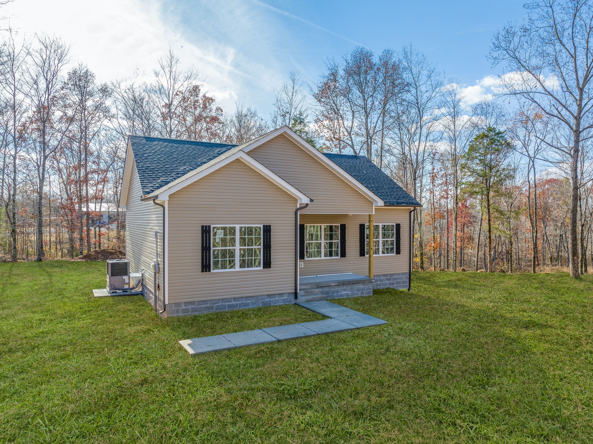 511 Sam Hollow Road Dickson, TN 37055 - Photo 5 of 40 a front view of house with yard and green space