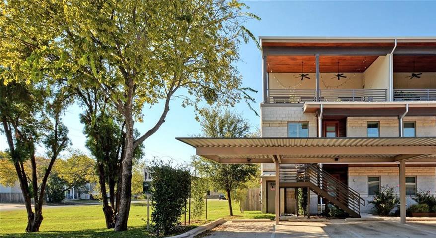 View of building exterior featuring stairs
