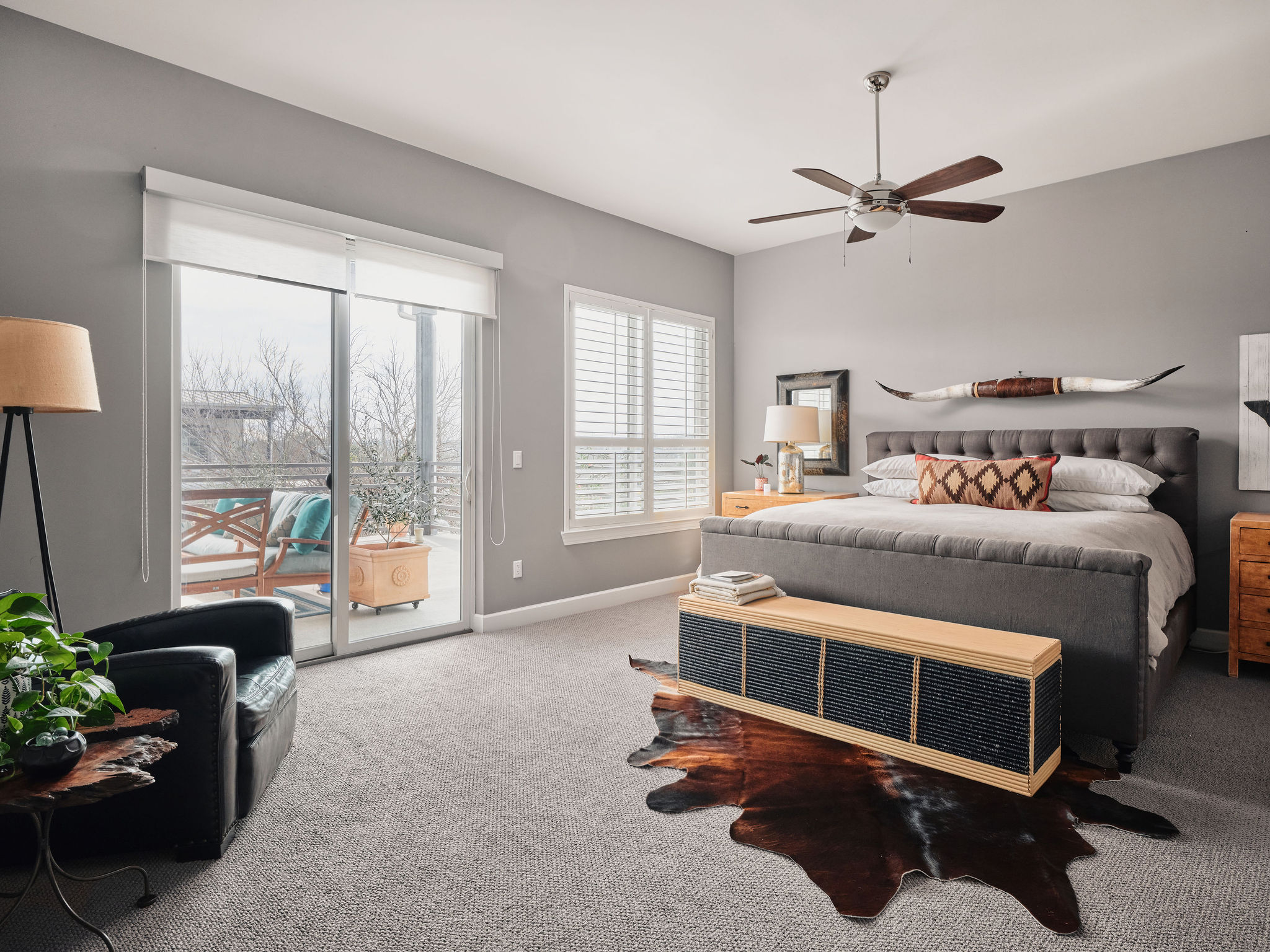 1504 Collier Street, Unit 4 Austin, TX 78704 - Photo 15 of 39 Carpeted bedroom with access to exterior and ceiling fan