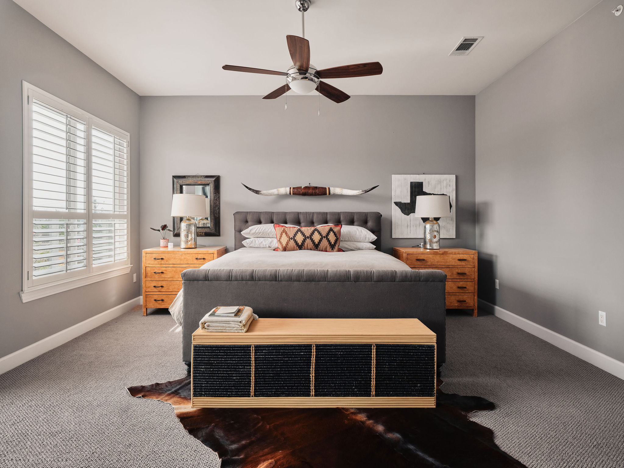 1504 Collier Street, Unit 4 Austin, TX 78704 - Photo 16 of 39 Carpeted bedroom with baseboards and a ceiling fan