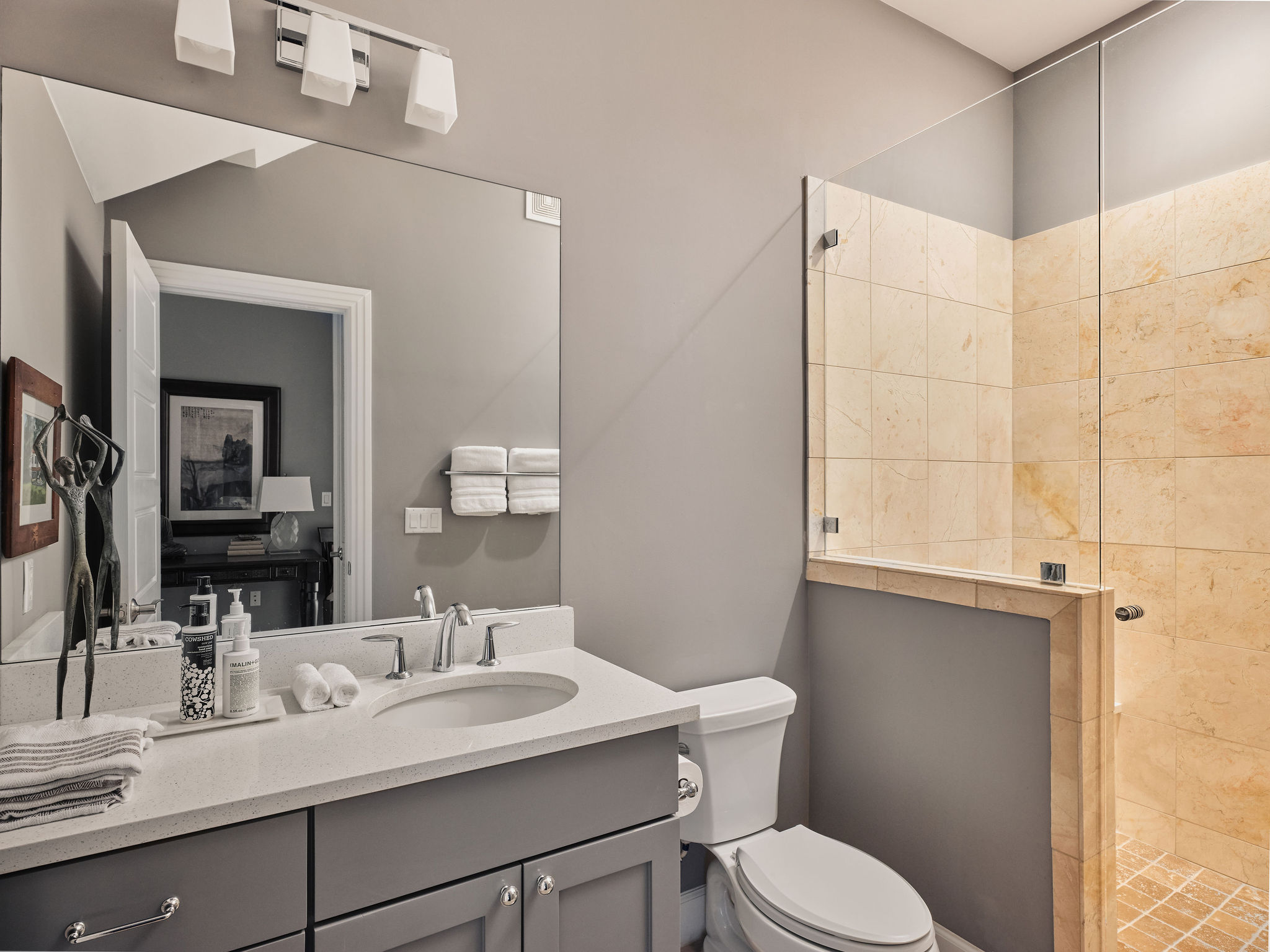 1504 Collier Street, Unit 4 Austin, TX 78704 - Photo 23 of 39 Bathroom with vanity and walk in shower