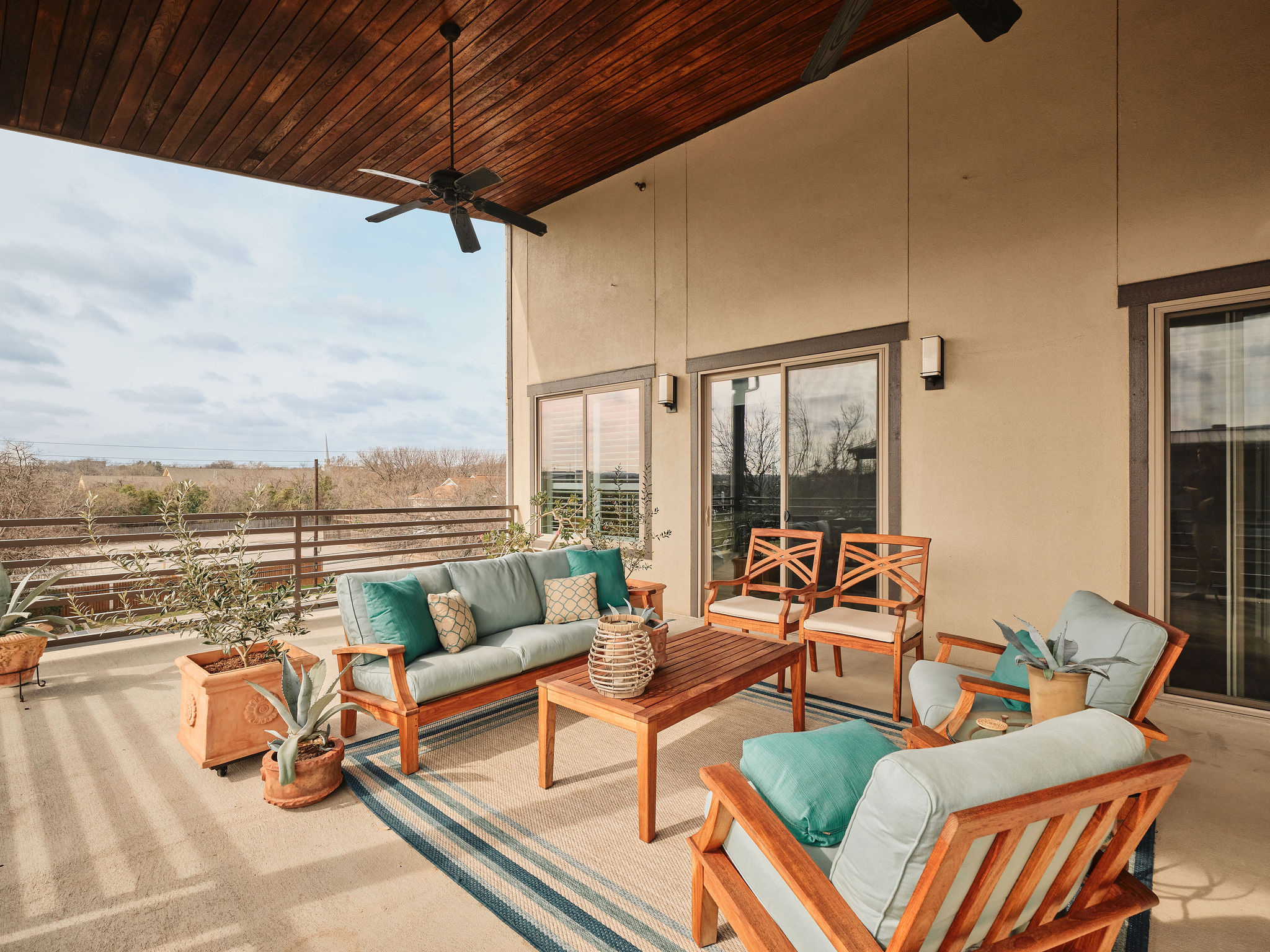 1504 Collier Street, Unit 4 Austin, TX 78704 - Photo 26 of 38 View of patio / terrace featuring ceiling fan and outdoor seating
