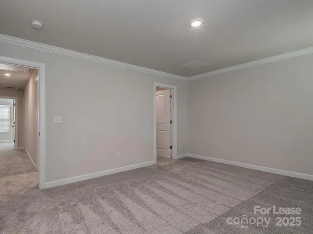 a bathroom with a shower sink and mirror