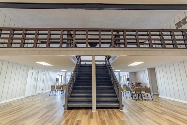a view of a patio with a table and chairs