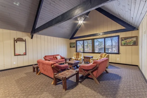 a view of balcony with furniture