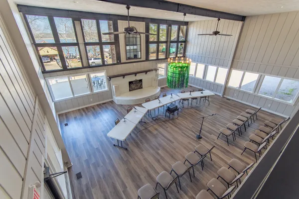 a view of a patio with a table and chairs