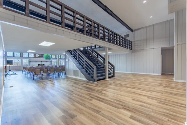 a kitchen with stainless steel appliances kitchen island granite countertop a refrigerator and a stove