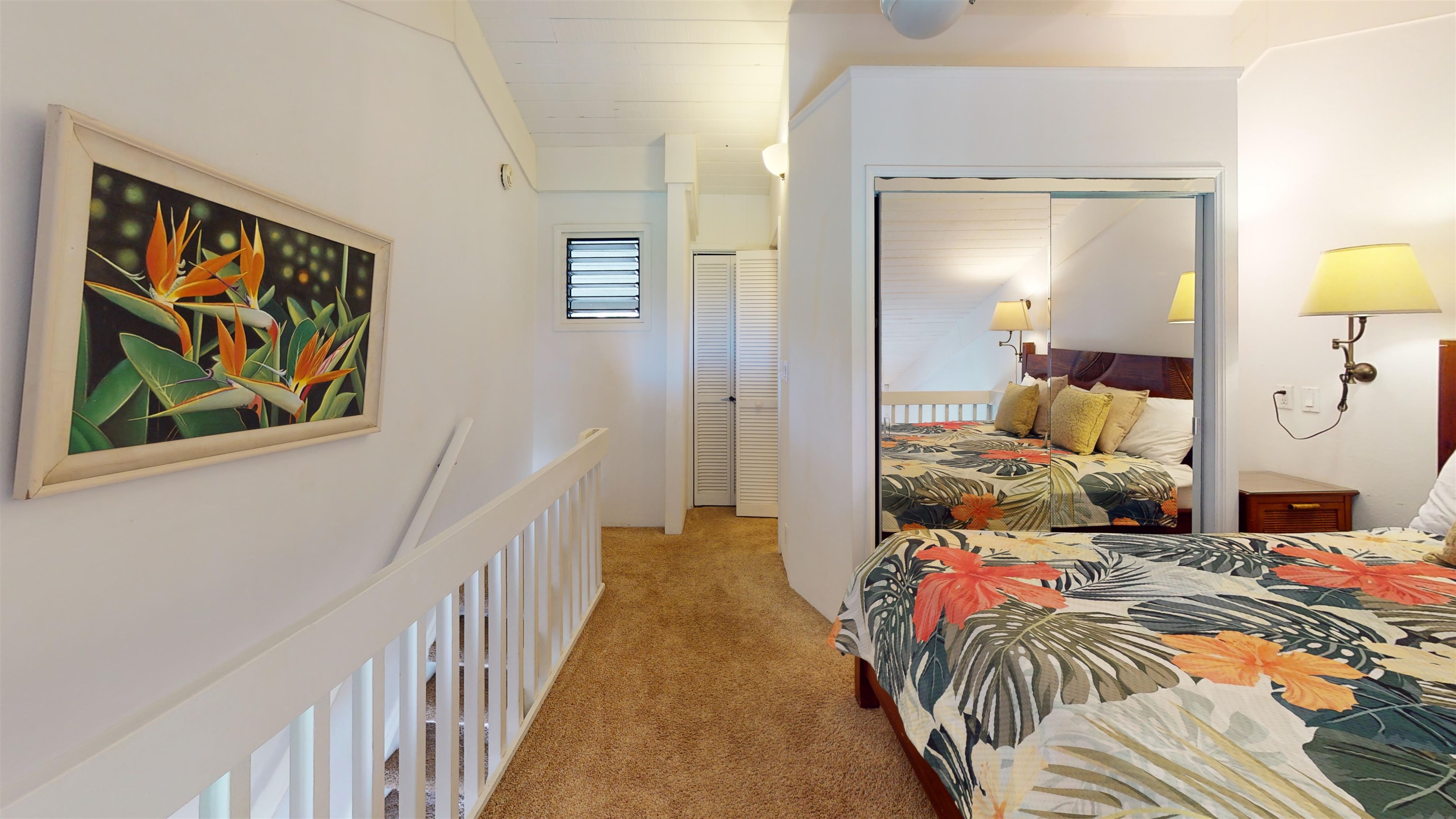 5255 Lower Honoapiilani Road, Unit 212 Lahaina, HI 96761 - Photo 12 of 17 a bedroom with a bed and lamp