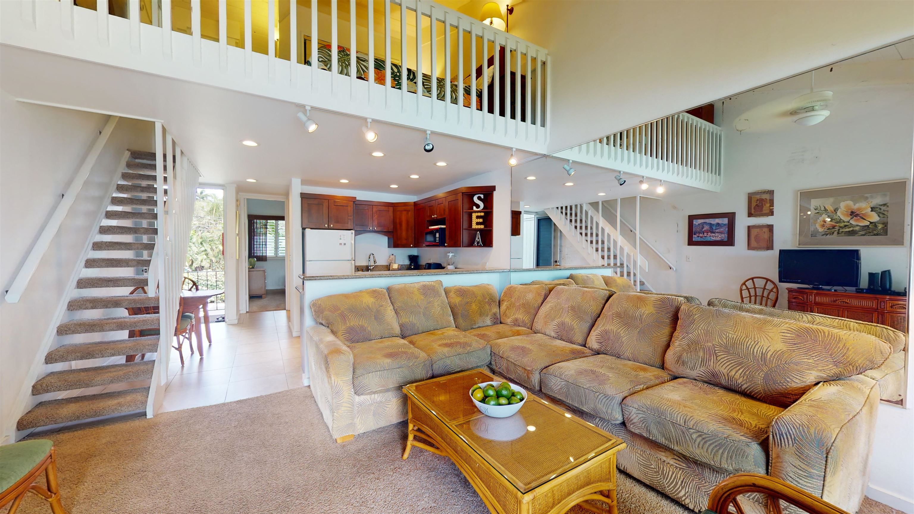 5255 Lower Honoapiilani Road, Unit 212 Lahaina, HI 96761 - Photo 3 of 17 a view of kitchen with dining table and chairs