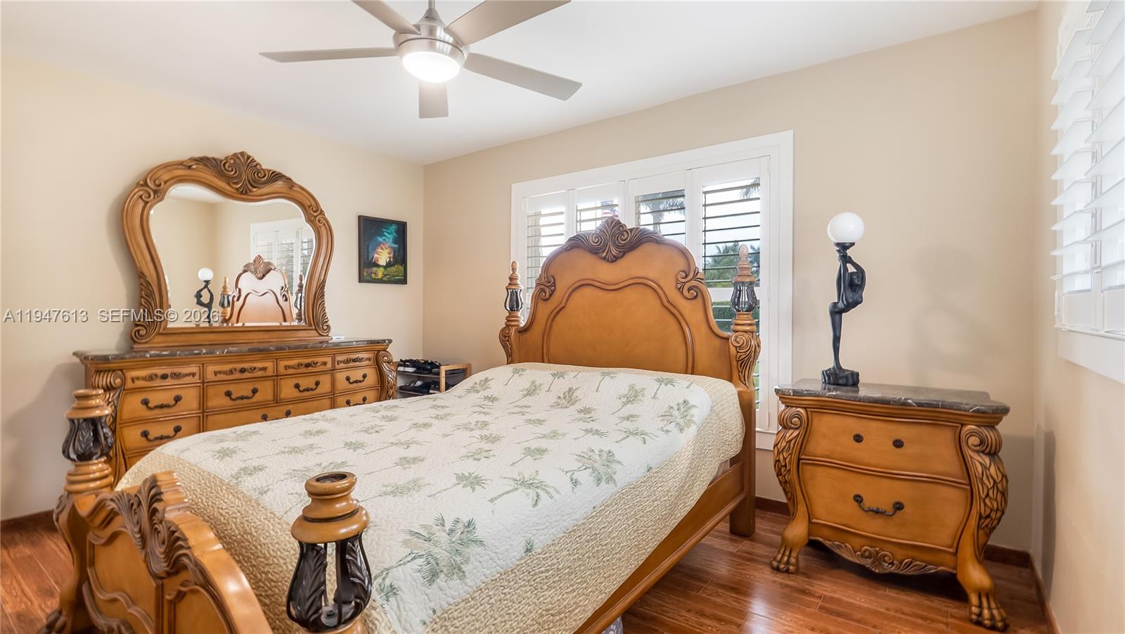 11071 Southwest 30th Court Davie, FL 33328 - Photo 19 of 44 a bedroom with a bed and a dresser