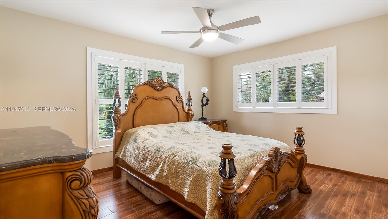 11071 Southwest 30th Court Davie, FL 33328 - Photo 20 of 44 a bedroom with a bed and window