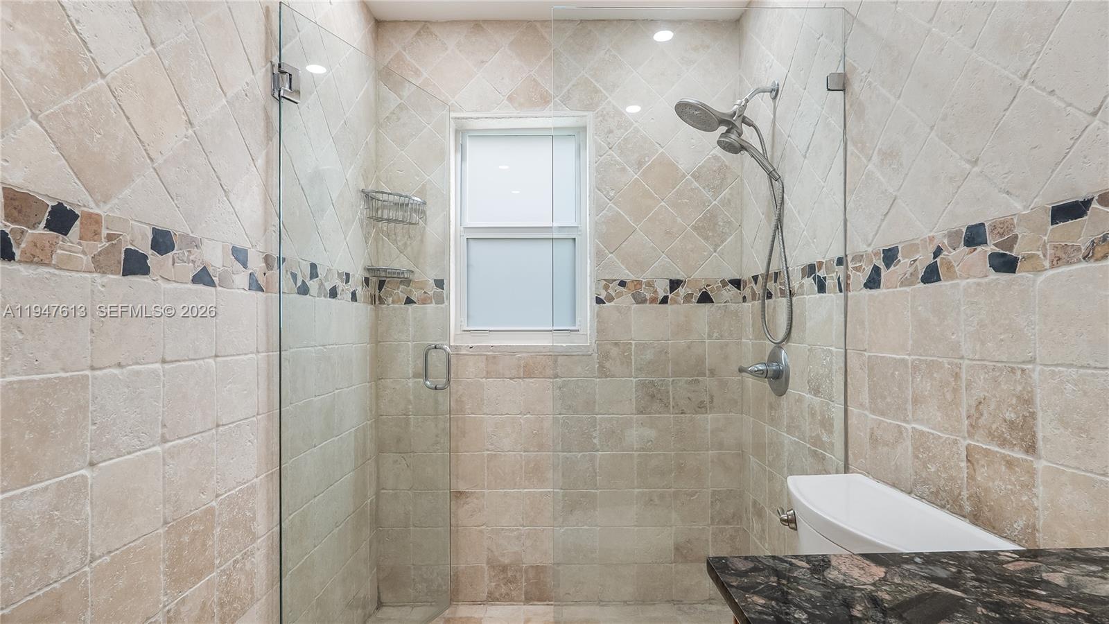11071 Southwest 30th Court Davie, FL 33328 - Photo 22 of 44 a bathroom with a shower