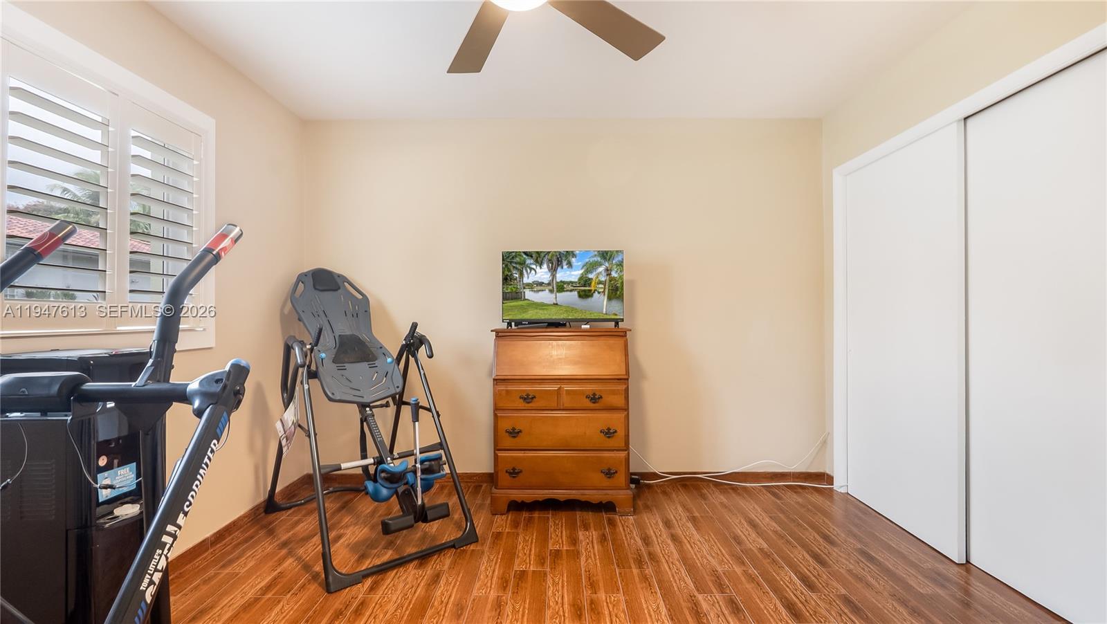 11071 Southwest 30th Court Davie, FL 33328 - Photo 24 of 44 a view of a room with gym equipment