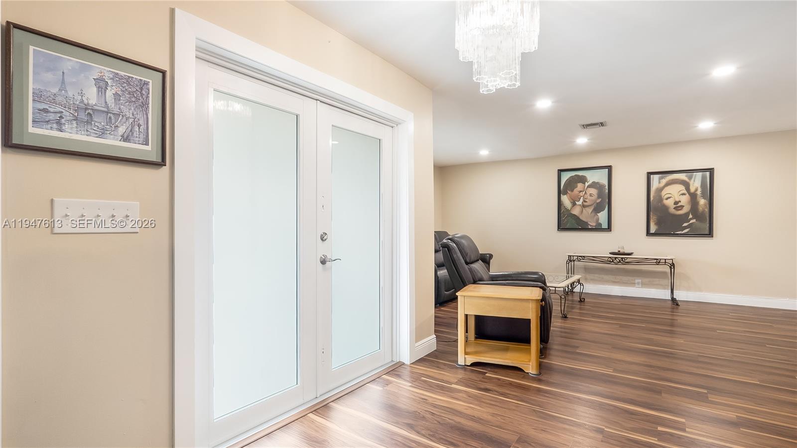 11071 Southwest 30th Court Davie, FL 33328 - Photo 26 of 44 a bedroom with furniture and wooden floor