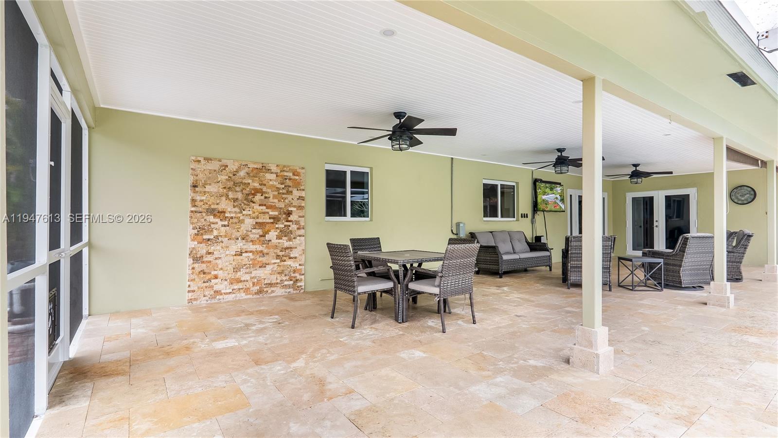 11071 Southwest 30th Court Davie, FL 33328 - Photo 31 of 44 a view of a livingroom with furniture and a window