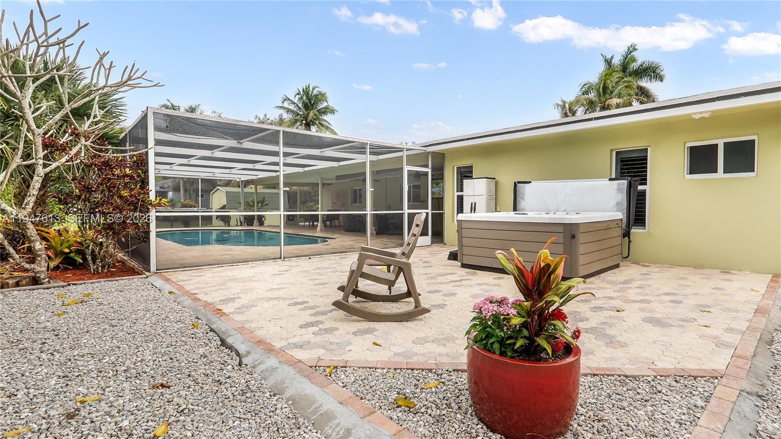 11071 Southwest 30th Court Davie, FL 33328 - Photo 36 of 44 a view of a house with a potted plant