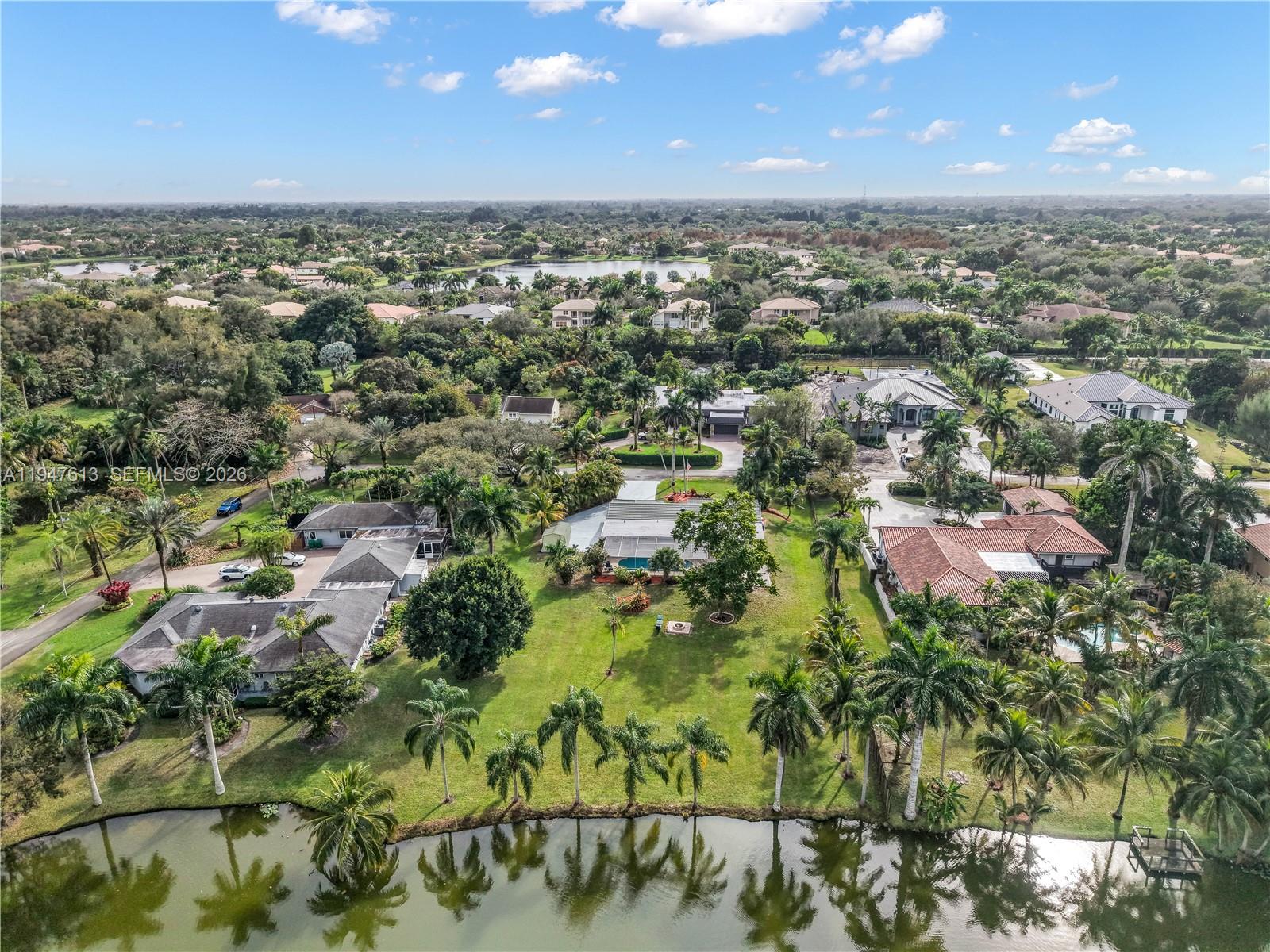 11071 Southwest 30th Court Davie, FL 33328 - Photo 41 of 44 an aerial view of residential building with trees in the background