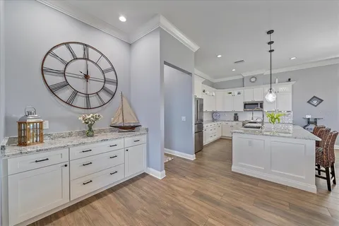 a bedroom with a bed and a table