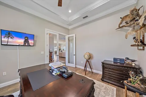 a bathroom with a granite countertop sink a toilet and a mirror
