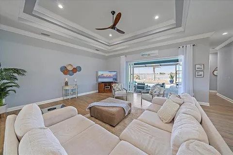 an aerial view of a house with a lake view