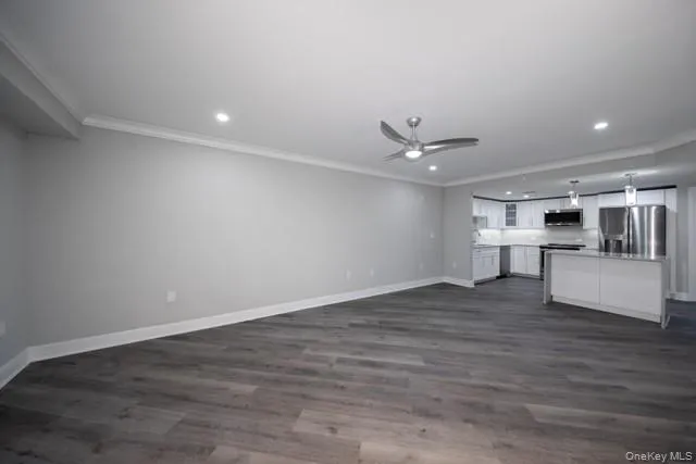 a view of cabinets and wooden floor